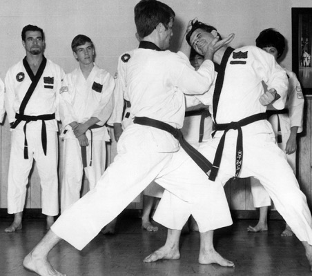 Harold Gross and Fred Wren demonstrate at the Texas Karate Institute. In the back are James Toney and Keith Yates.

