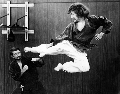 Yates jumps at Royce Young at the Texas Karate Institute school on Webb Royal in Dallas in 1972.

