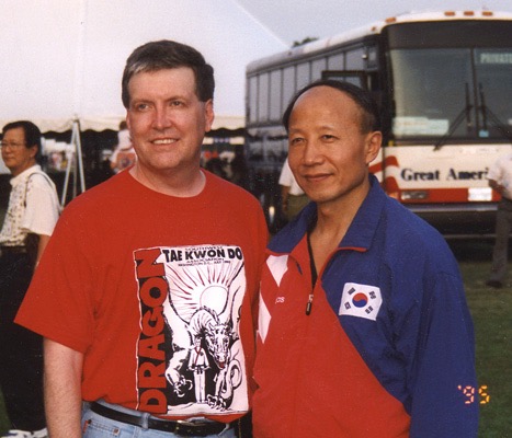 1995, Keith Yates, coach of the American team and Chung Park, coach of the Korean team pose at the dedication of the Korean War Memorial in Washington D.C.

